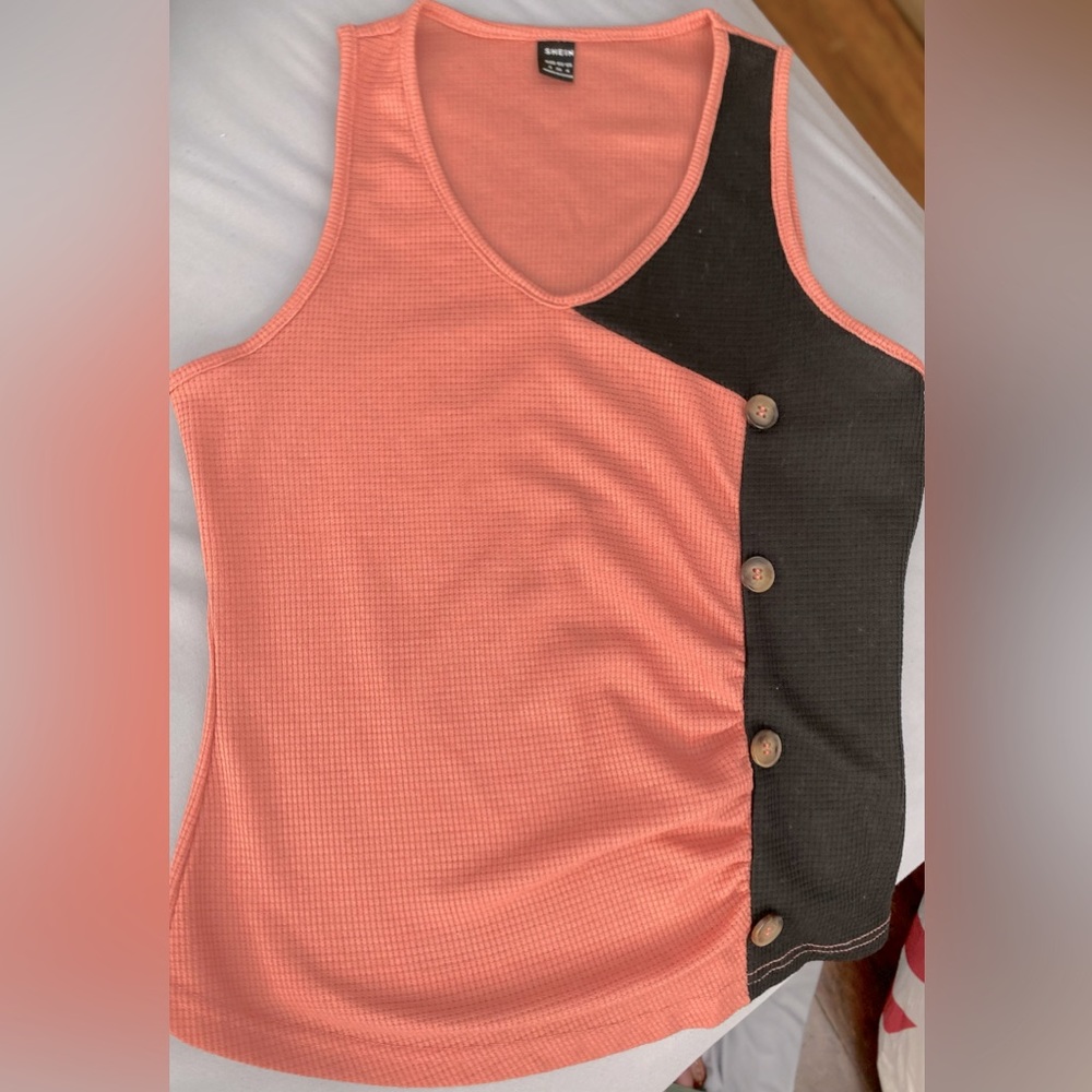 Cute coral and black tank with buttons on side. Size small, only tried on once.